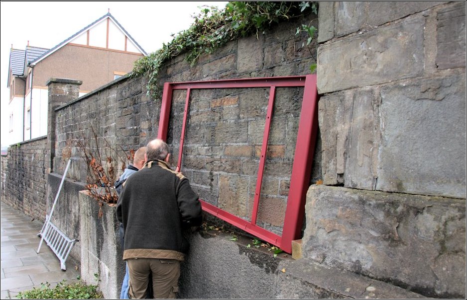 The frame from Tumble Forge is offered up to the wall, looks good, ready for positioning The frame from Tumble Forge is offered up to the wall, looks good, ready for positioning
