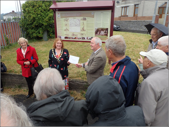 Chairman receives cheque from Councillor Sian Caiach Chairman receives cheque from Councillor Sian Caiach